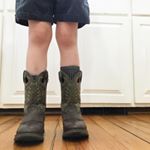 Because to him, Spring weather is boot weather.  #boymom #boots